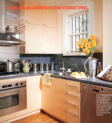 Kitchen view 2.  Full-height cabinetry takes advantage of the generous ceiling height to maximize available storage.  Published in Better Homes and Gardens Kitchen and Bath Ideas, January 2002.